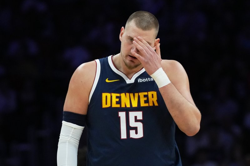 Nikola Jokic to undergo MRI after knee injury against Miami