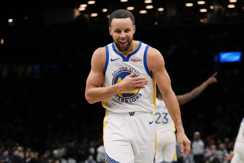 Curry, Butler power Warriors past Nets 120-107