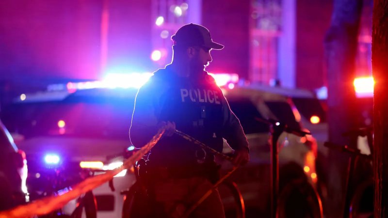 Police scour Brown University after gunman kills two and injures nine