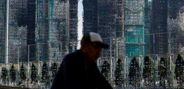 Hong Kong launches judge-led probe after deadly fire 