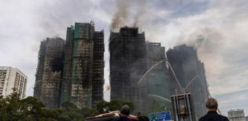 Hong Kong authorities search for 31 missing after deadly fire