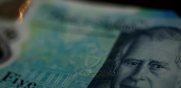 Sterling holds steady after biggest daily rise since April 