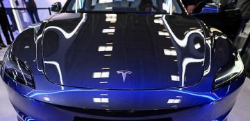 Tesla rolls out low-cost Model 3 in Europe 