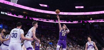 Doncic’s triple-double lifts Lakers past Jazz 143-135