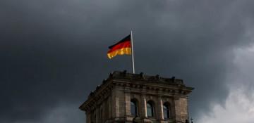 Germany charges ex-Syrian agent over jail murders