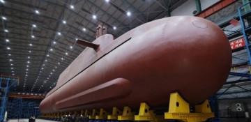 N. Korea's Kim inspects new 8,700-ton nuclear-powered submarine
