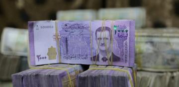 Syria to launch currency swap on January 1 