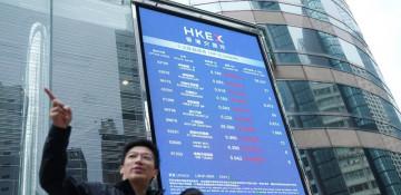 Asia stocks surge; gold and silver hit record highs 