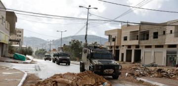 Israeli forces occupy homes, enforce curfew in Qabatiya, West Bank. 
