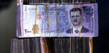 Syria introduces new banknotes after redenomination