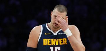 Nikola Jokic to undergo MRI after knee injury against Miami