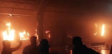 Passenger dies as two train coaches catch fire in India