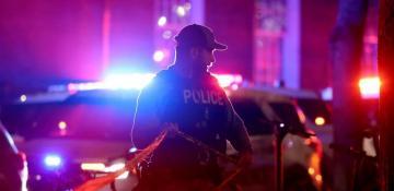 Police scour Brown University after gunman kills two and injures nine