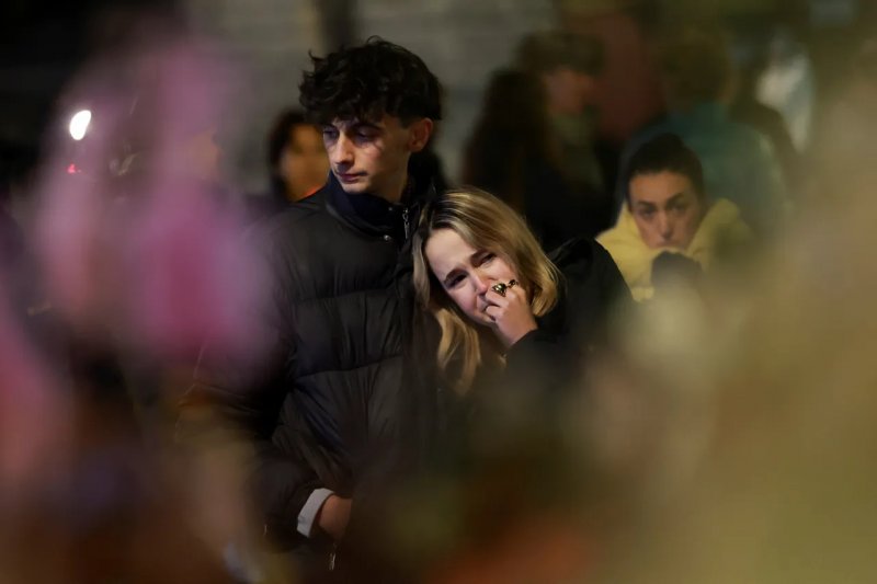 Vigil for Swiss fire victims marked by tears and silence 