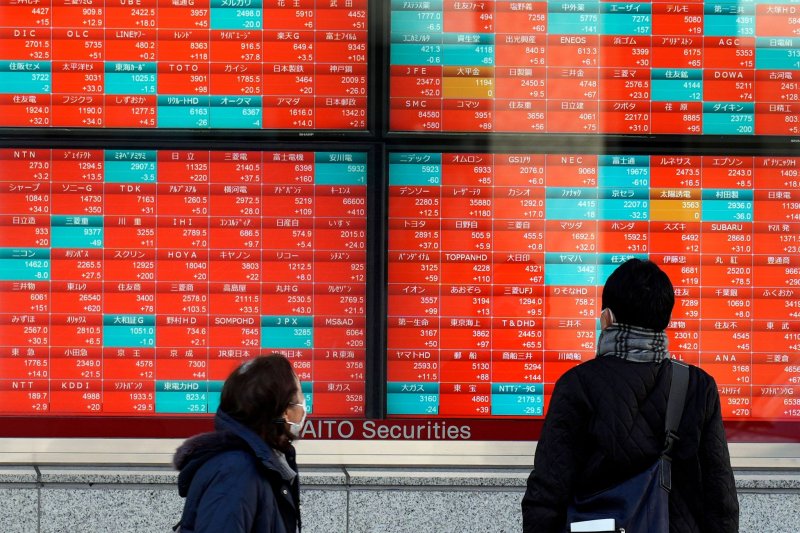 Asian shares rise as Wall Street gains; oil retreats