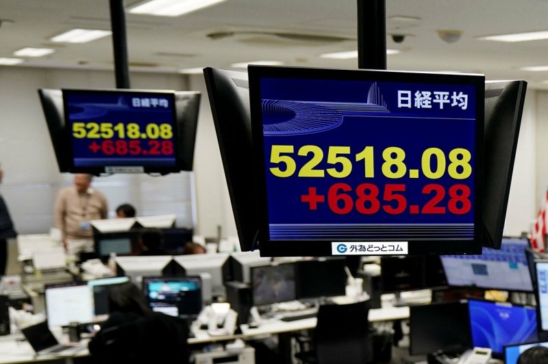 Japan stocks hit record highs on Venezuela oil outlook
