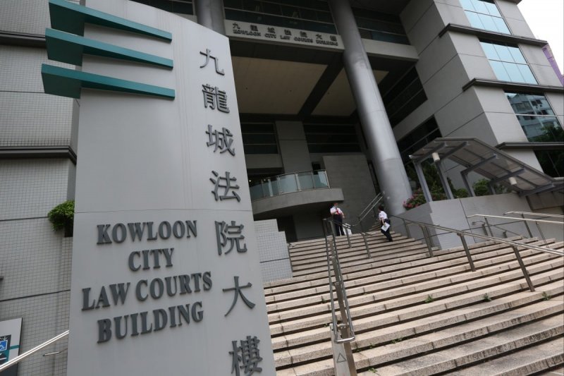 Hong Kong police charge man with manslaughter in hotel death 