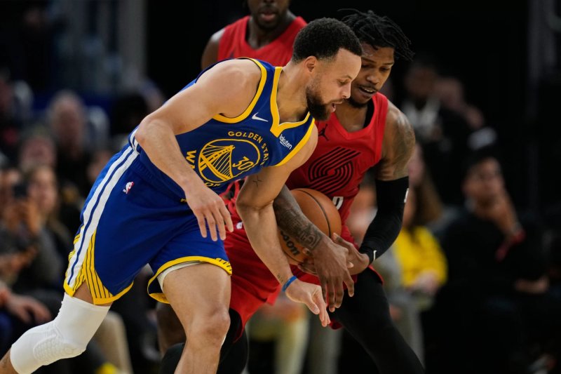 Warriors dominate Trail Blazers 119-97 behind Curry, Butler