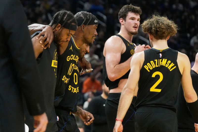 Jimmy Butler injures knee in Warriors’ win over Heat