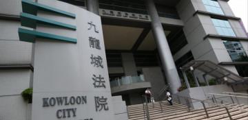 Hong Kong police charge man with manslaughter in hotel death 