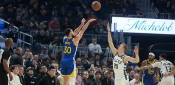 Curry’s 31 points lift Warriors past Bucks