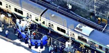 Train collides with car at rail crossing in Japan