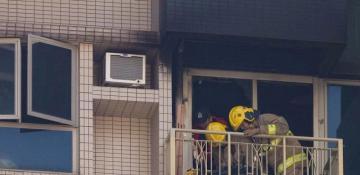 1 dead as fire in Hong Kong high-rise flat forces mass evacuation of residents 