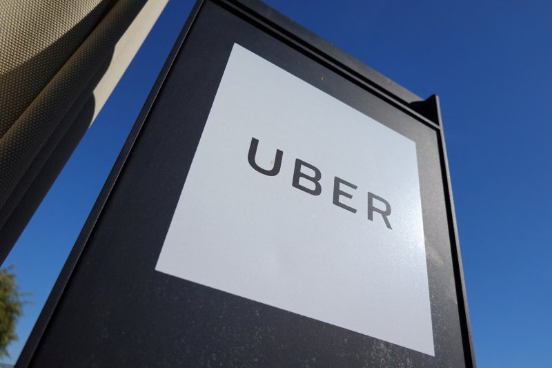 Uber shares slide as higher taxes hit outlook