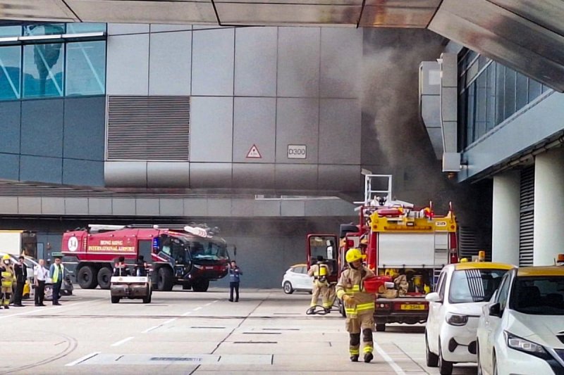 Fire at Hong Kong airport briefly disrupts operations 