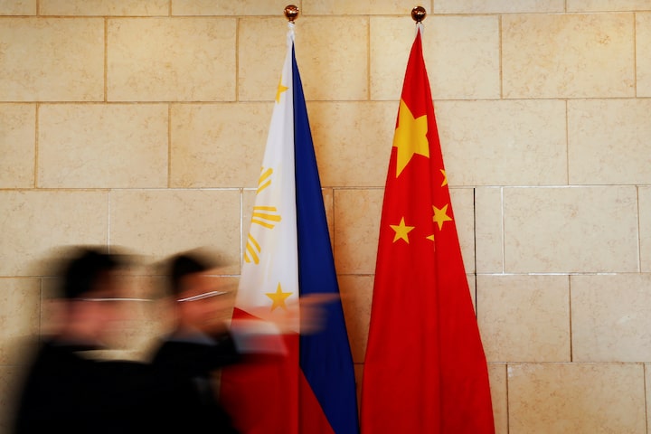 Philippines urges China to keep rhetoric calm 