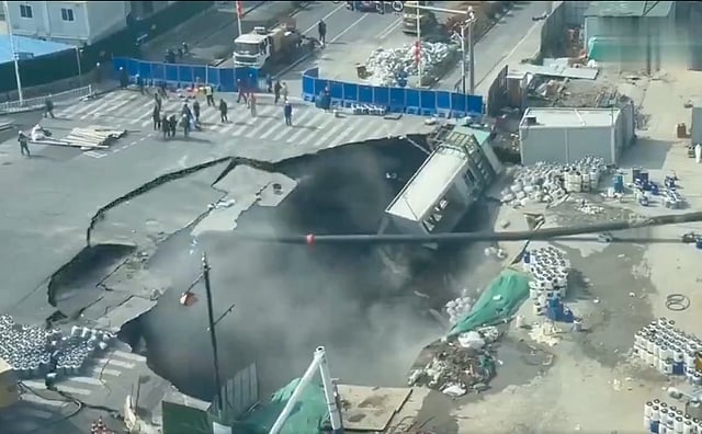 Giant sinkhole devours road in Shanghai