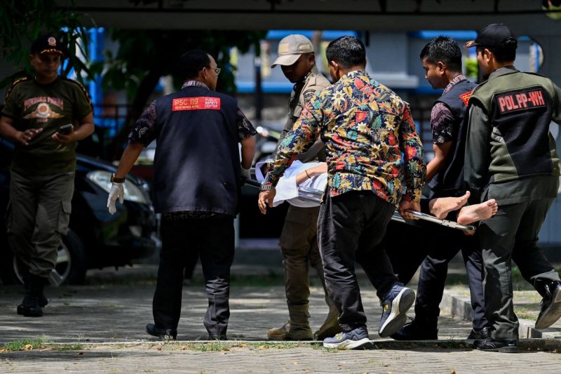 14-year-old's death from police helmet sparks anger in Indonesia