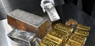 Gold, silver extend losses after record rally reverses