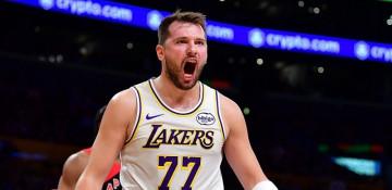 Doncic, James power Lakers past Raptors at home