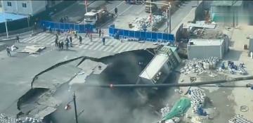 Giant sinkhole devours road in Shanghai