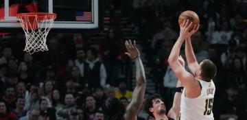 Jokic powers Denver to record road win over Portland