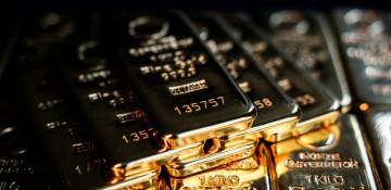 Gold retreats after rally fueled by Mideast tensions