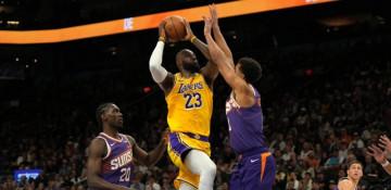O'Neale's late 3 lifts Suns past Lakers 113-110