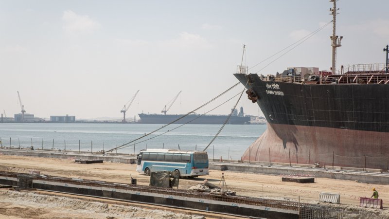 Iran strikes Omani port, one worker injured