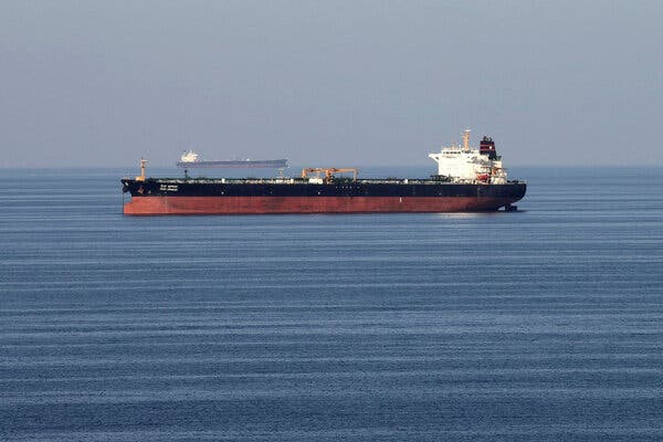 Tug hit by unknown projectiles in Strait of Hormuz 