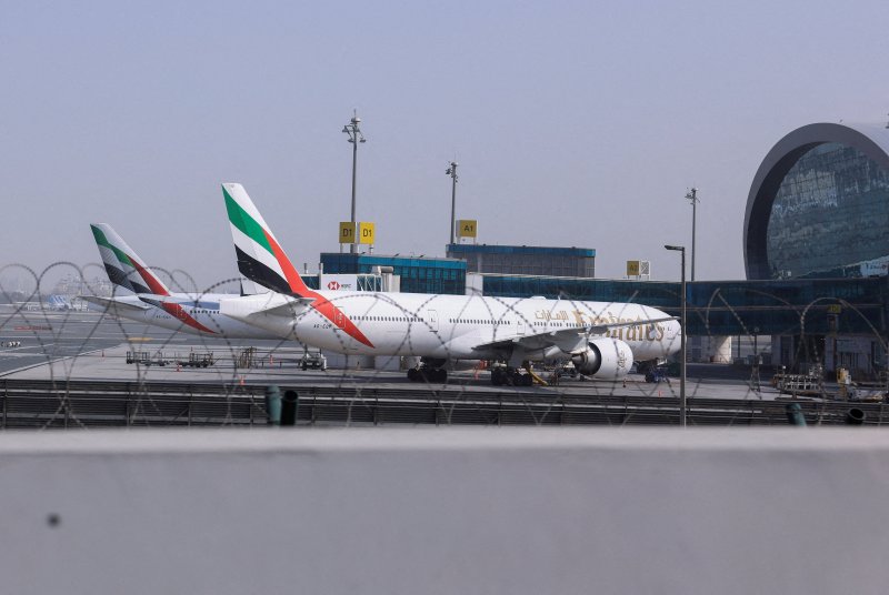 Chaos at world’s busiest airport after missile alert in Dubai