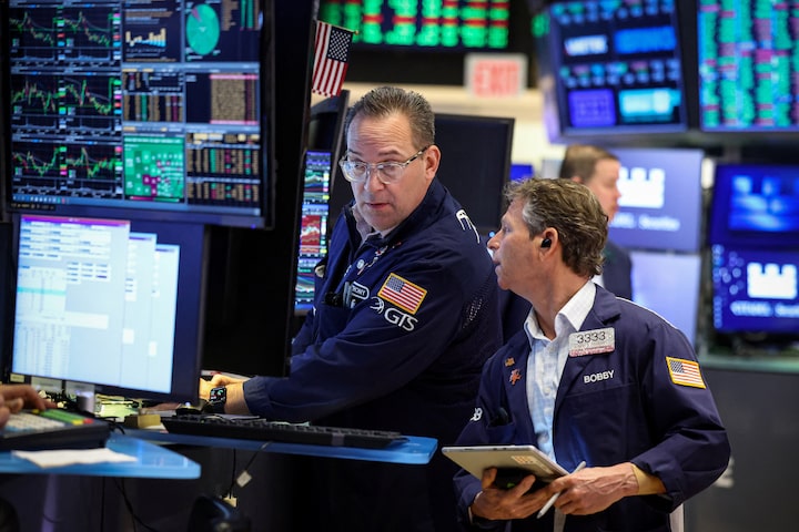 Wall Street futures slip as oil hits $100 a barrel