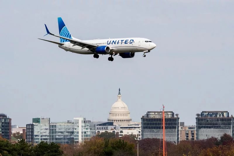 United cuts flights as oil outlook darkens to 2027