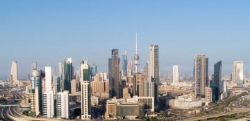 Sirens blare across Kuwait City