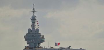 France sending aircraft carrier to Mediterranean, Macron says 