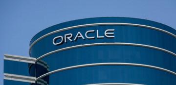 Oracle weighs wide job cuts amid $50B AI expansion plan