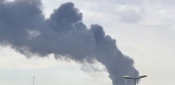  In Photos:  Smoke rises from Kuwait airport after Iranian drone strike