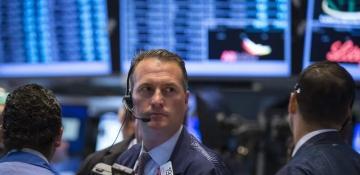 Wall Street mixed as Fed signals steady policy amid tensions