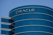 Oracle weighs wide job cuts amid $50B AI expansion plan