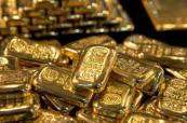 Gold drops amid stronger dollar and rate concerns